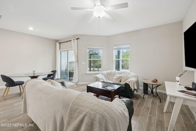 living room with ceiling fan