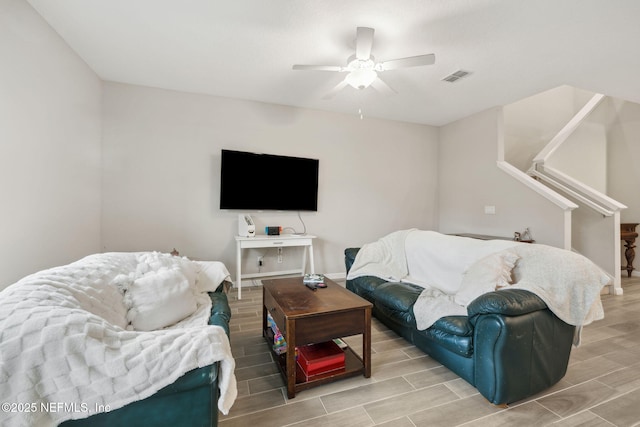 living room featuring ceiling fan