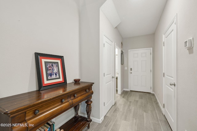 hallway featuring light wood-type flooring