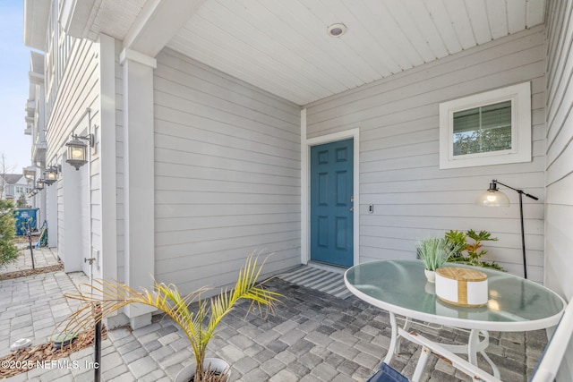 doorway to property featuring a patio