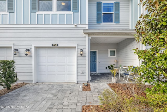 entrance to property with a garage