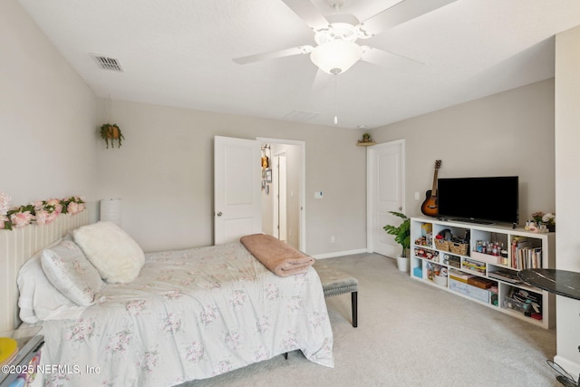 carpeted bedroom featuring ceiling fan