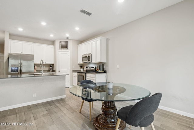 dining area with sink