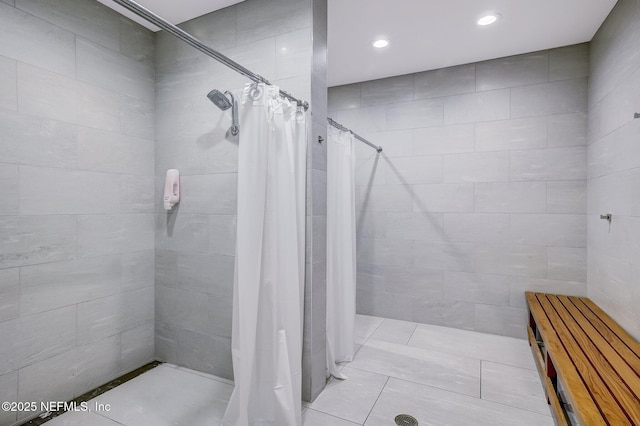 bathroom with a shower with curtain