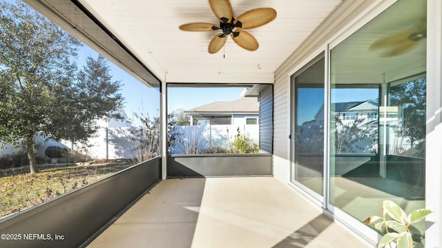 balcony featuring ceiling fan