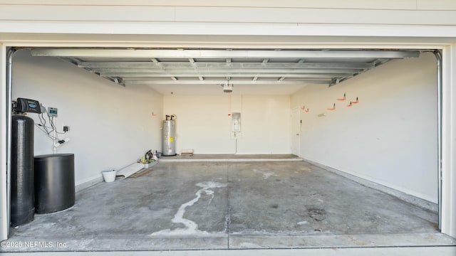 garage with electric panel and water heater