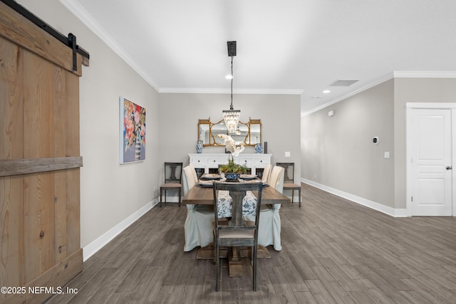 dining space featuring crown molding, a chandelier, and dark hardwood / wood-style flooring