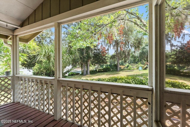 exterior space with vaulted ceiling