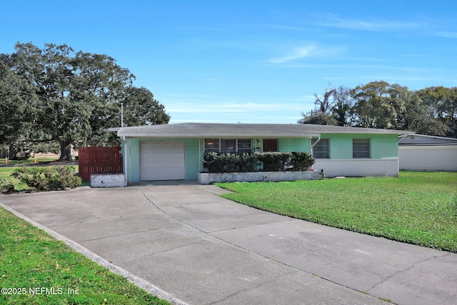 ranch-style house with a garage and a front yard