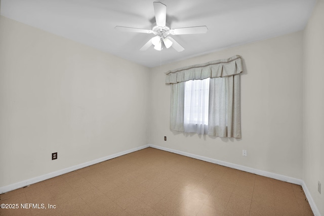 unfurnished room with ceiling fan