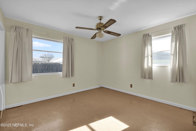 empty room featuring ceiling fan