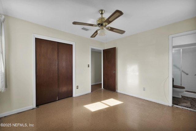 unfurnished bedroom featuring ceiling fan and a closet