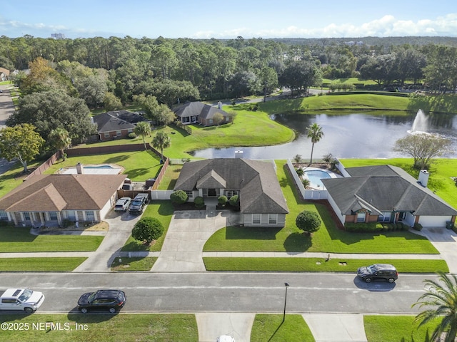 drone / aerial view with a water view