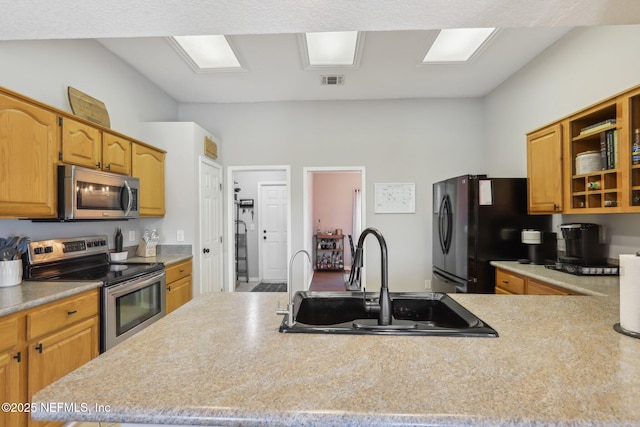 kitchen featuring stainless steel appliances and sink