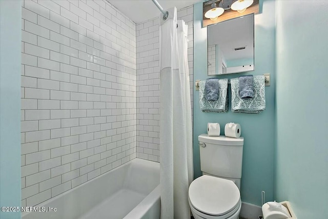 bathroom featuring shower / bathtub combination with curtain and toilet