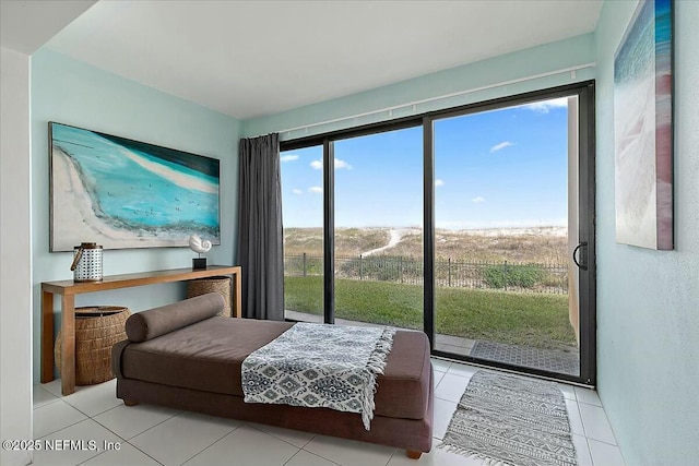 tiled bedroom featuring access to outside