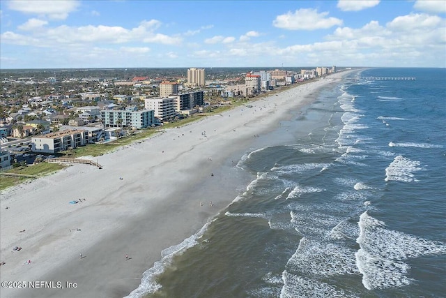 aerial view featuring a water view and a view of the beach