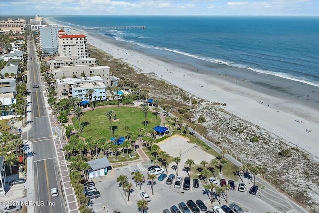 bird's eye view featuring a beach view and a water view