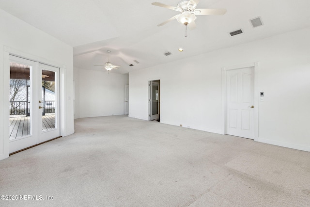 unfurnished room with light carpet, ceiling fan, and french doors