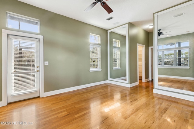 interior space featuring light hardwood / wood-style floors and ceiling fan