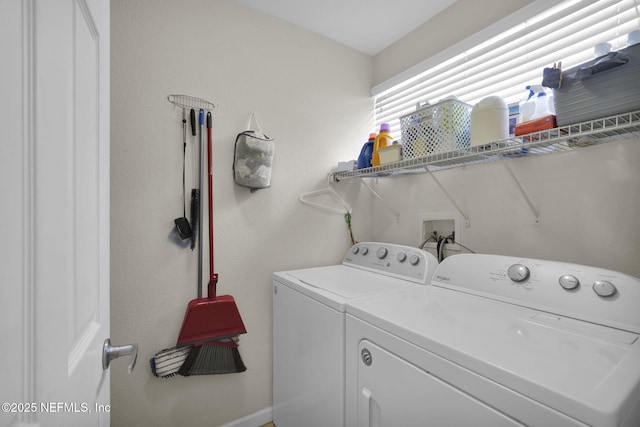 washroom with separate washer and dryer