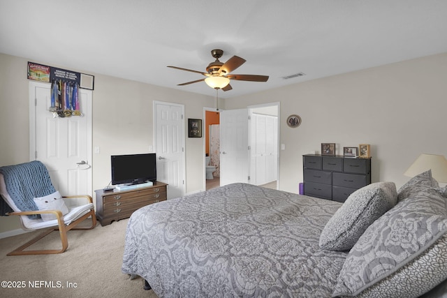 bedroom with light carpet and ceiling fan