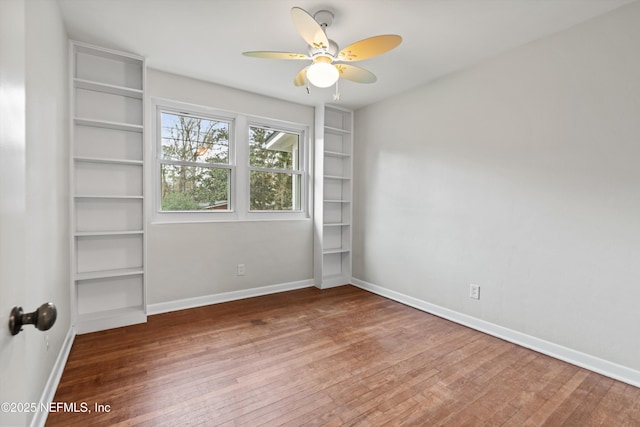 unfurnished bedroom featuring hardwood / wood-style flooring and ceiling fan