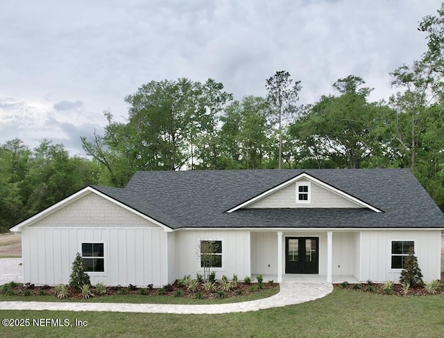 6141 Charlie Rowe Dr, Macclenny, FL 32063 - modern inspired farmhouse featuring board and batten siding, french doors, and roof with shingles