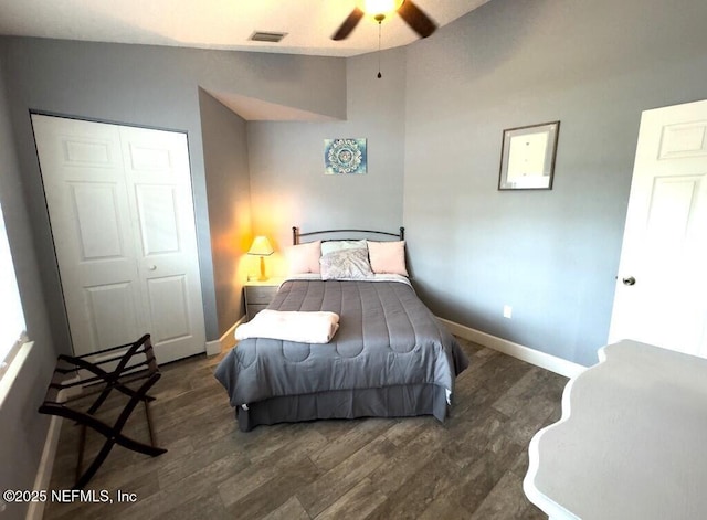 bedroom featuring vaulted ceiling and dark hardwood / wood-style floors