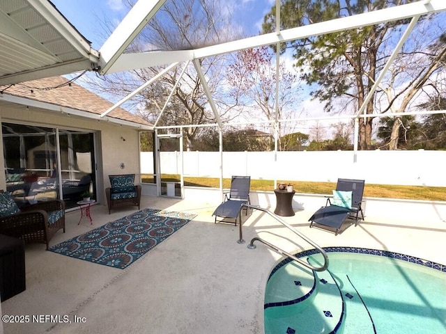 view of pool featuring a lanai and a patio area