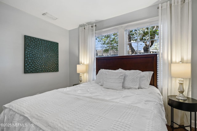 bedroom with visible vents