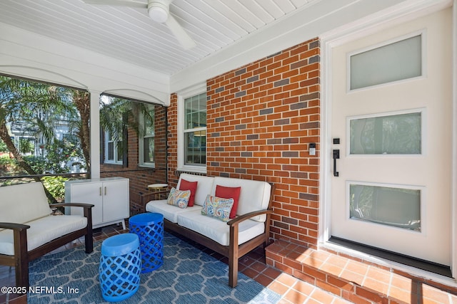 view of patio with outdoor lounge area and ceiling fan