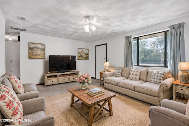 1019 Haynes Ct, Green Cove Springs, FL 32043 - carpeted living room with ceiling fan
