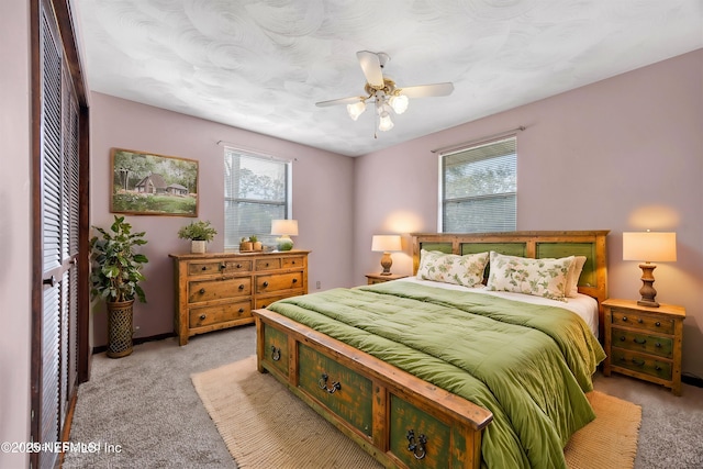1019 Haynes Ct, Green Cove Springs, FL 32043 - bedroom featuring multiple windows, light colored carpet, and ceiling fan