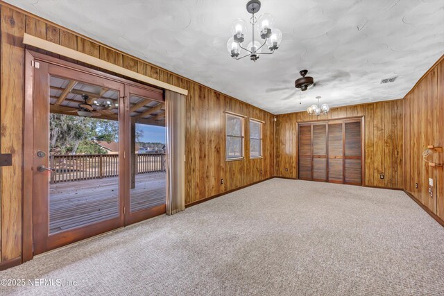 1019 Haynes Ct, Green Cove Springs, FL 32043 - interior space featuring an inviting chandelier and wood walls