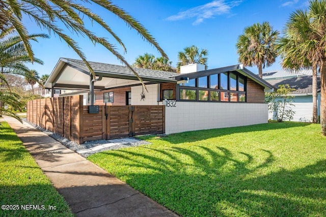 exterior space featuring a lawn