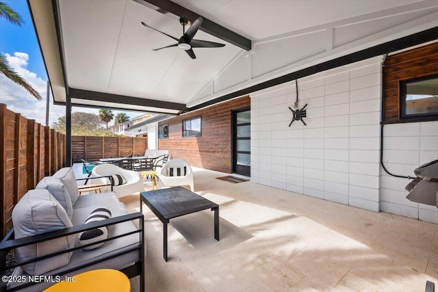 view of patio featuring an outdoor living space and ceiling fan