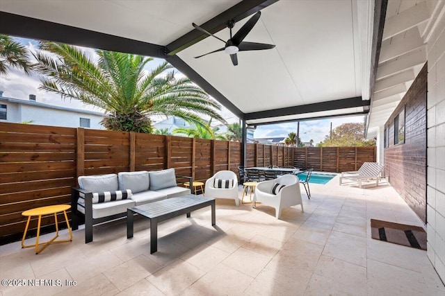 view of patio with ceiling fan, an outdoor hangout area, and a fenced in pool