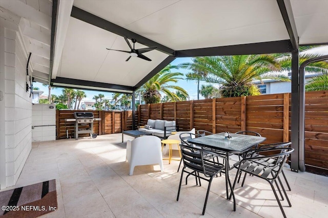 view of patio featuring an outdoor living space, a grill, and ceiling fan