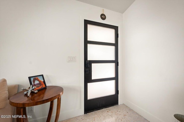 foyer entrance featuring plenty of natural light