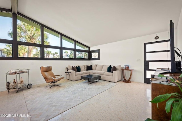 living room with vaulted ceiling