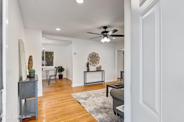 interior space featuring hardwood / wood-style flooring and ceiling fan