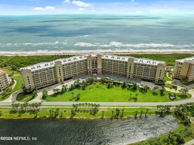 aerial view with a water view and a view of the beach