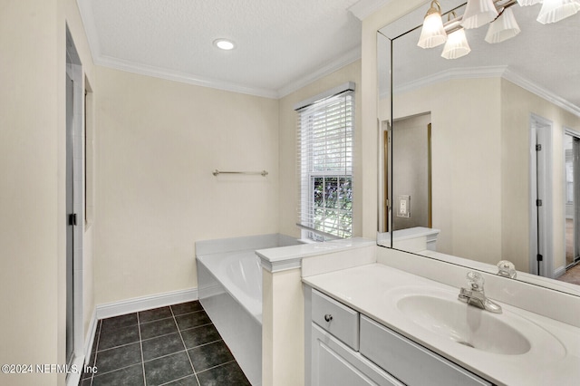 bathroom with a bath, tile patterned flooring, crown molding, and vanity