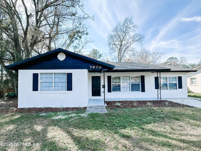 ranch-style house with a front yard