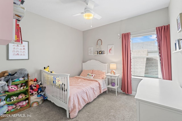 bedroom with light carpet and ceiling fan