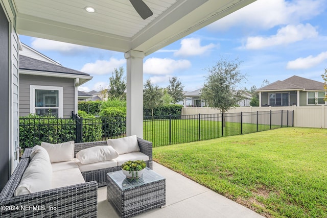 view of patio / terrace with an outdoor living space and ceiling fan