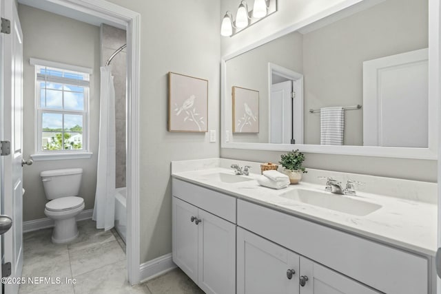 full bathroom with vanity, toilet, and shower / tub combo