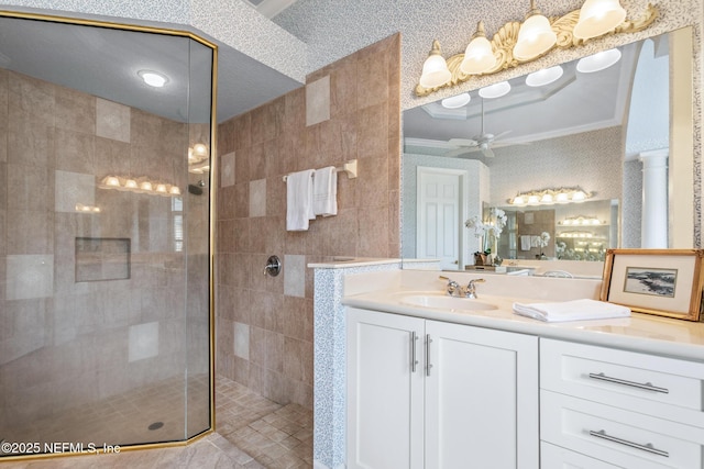2095 Crown Dr, Saint Augustine, FL 32092 - full bath featuring vanity, ornamental molding, ceiling fan, and a walk in shower