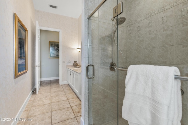 2095 Crown Dr, Saint Augustine, FL 32092 - bathroom with visible vents, a shower stall, baseboards, tile patterned floors, and vanity